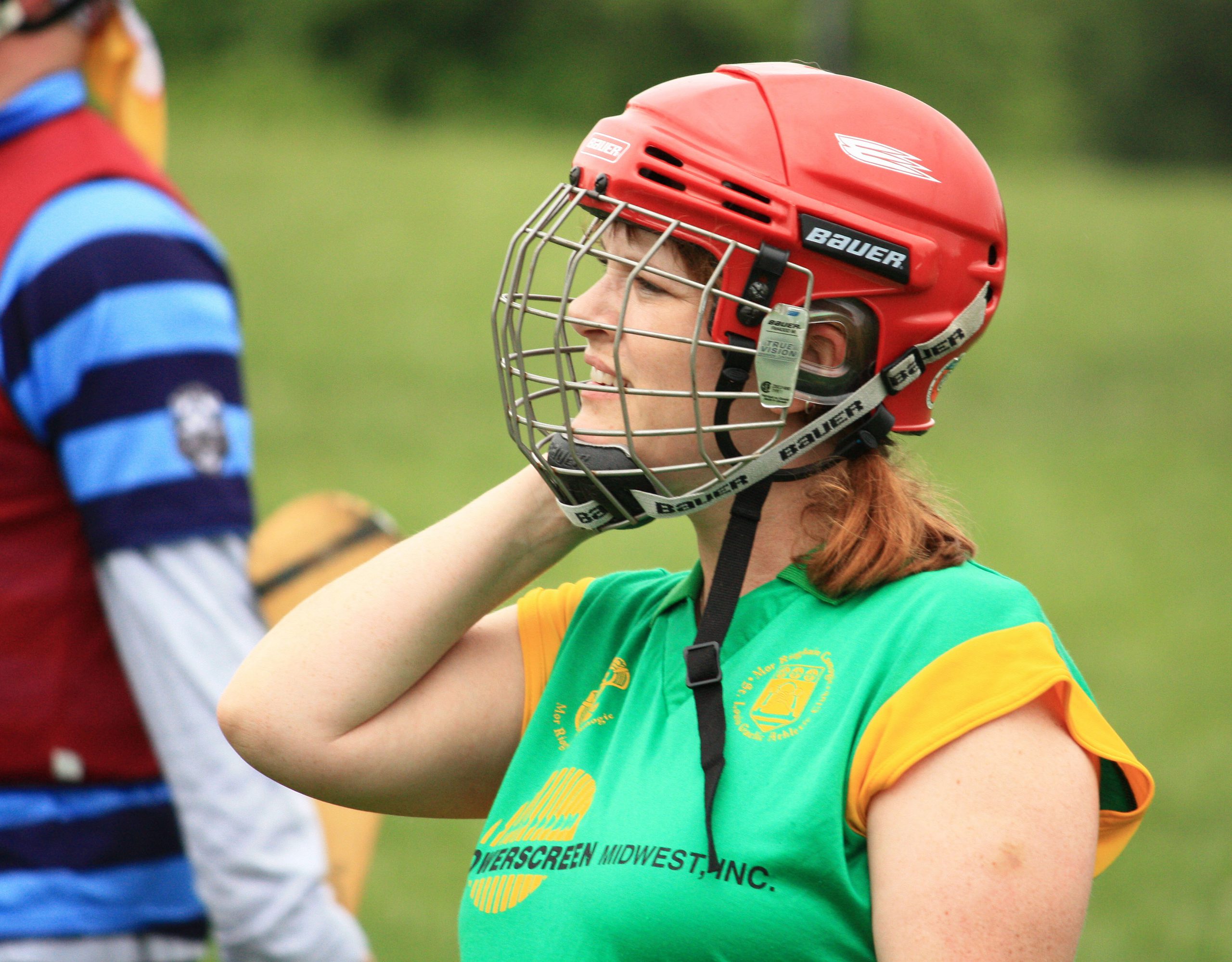 Une joueuse de Camogie - <a href='https://www.flickr.com/photos/dereksigler/4566774482/' target='_blank' rel=