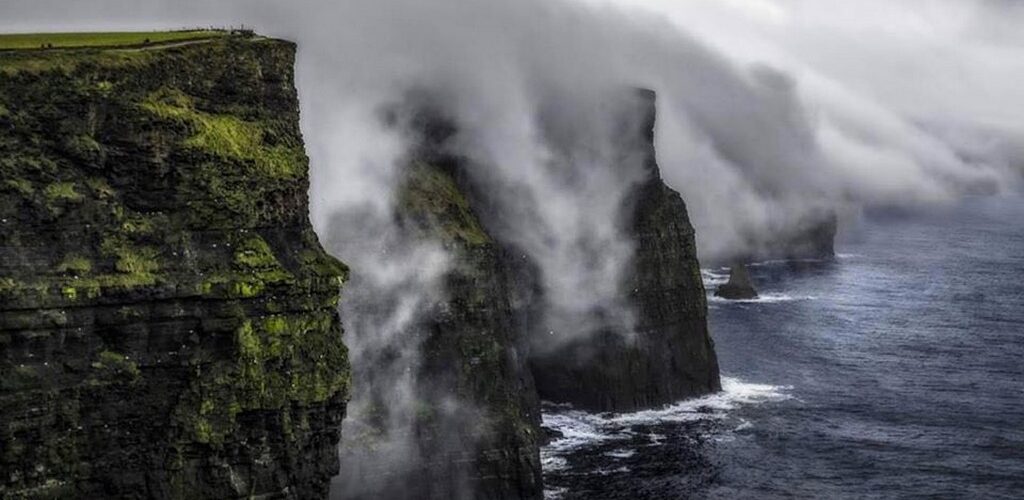 Cliffs of Moher: a waterfall seems to flow backwards!
